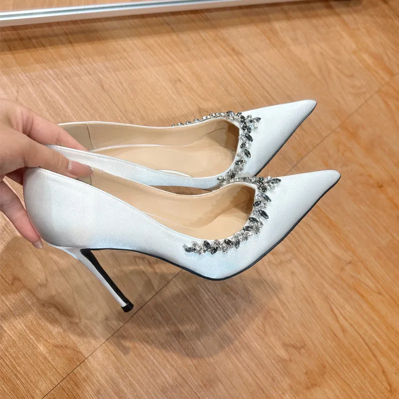 Women's black satin stiletto heels with rhinestone decoration and pointed toe