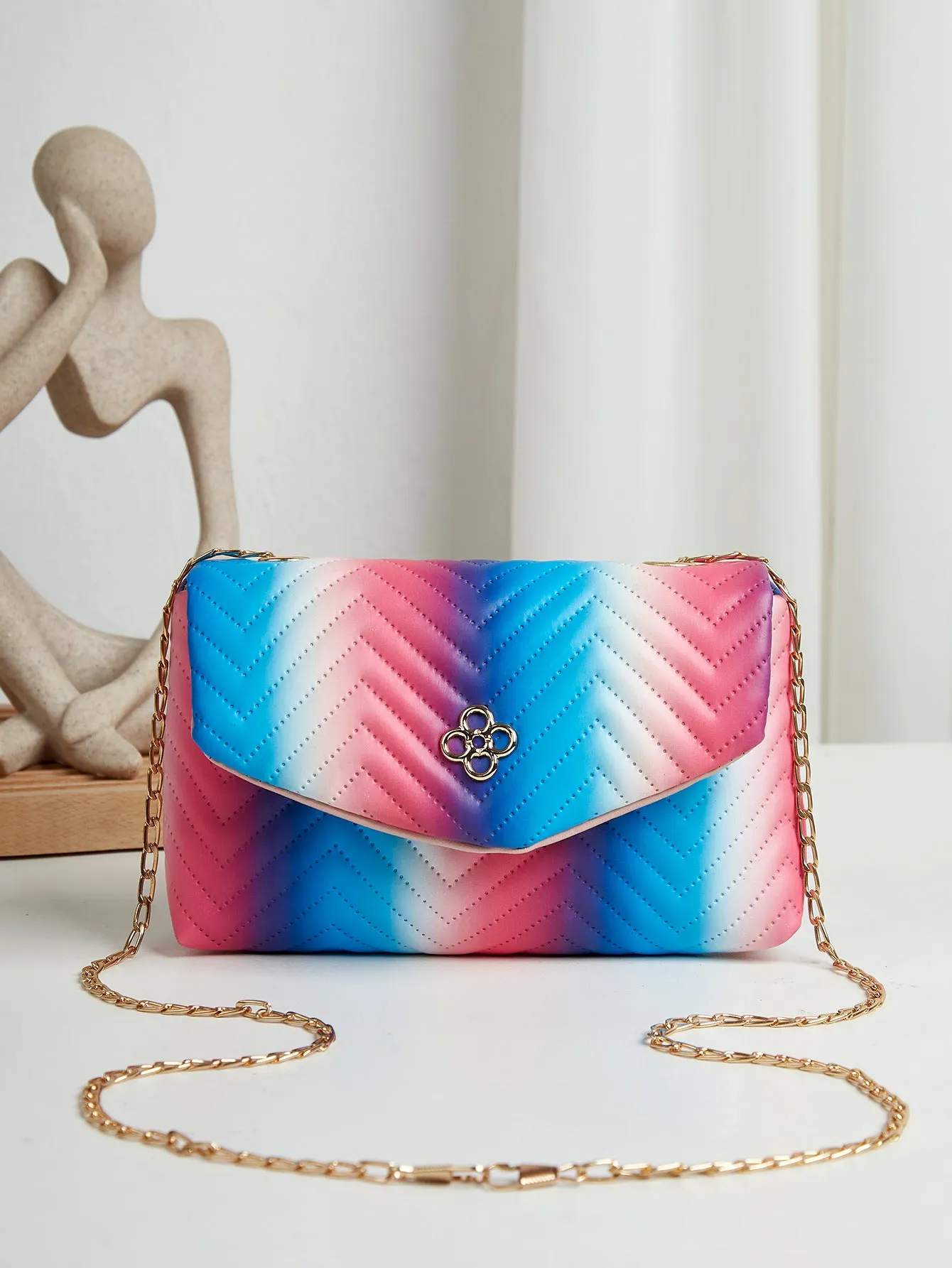 Soft PU clamshell bag with contrast colour pattern and single shoulder strap