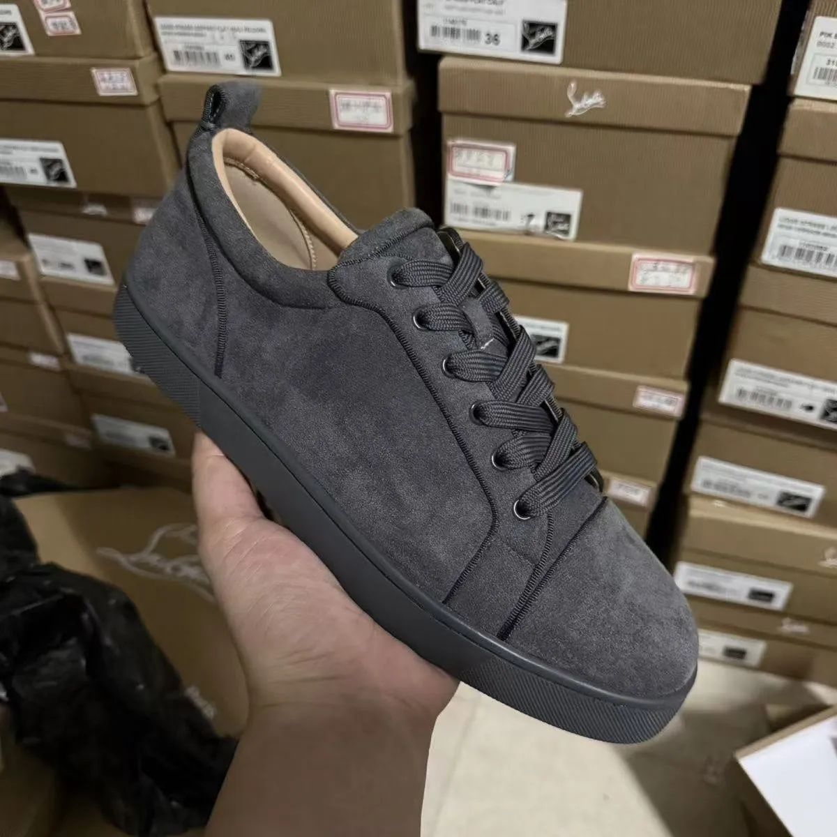 Men's grey colour-block casual sneakers with lace-up front and rubber sole on a white background