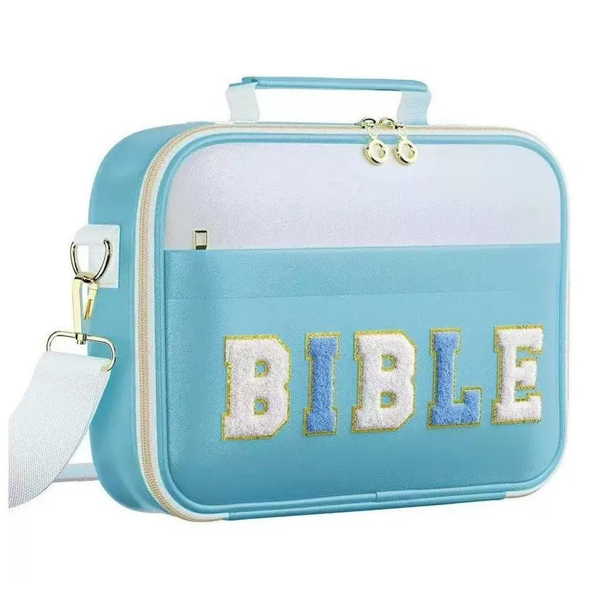 PU letter-pattern book handbag in light blue, 30.5x23 cm, with zippered top, on a white background