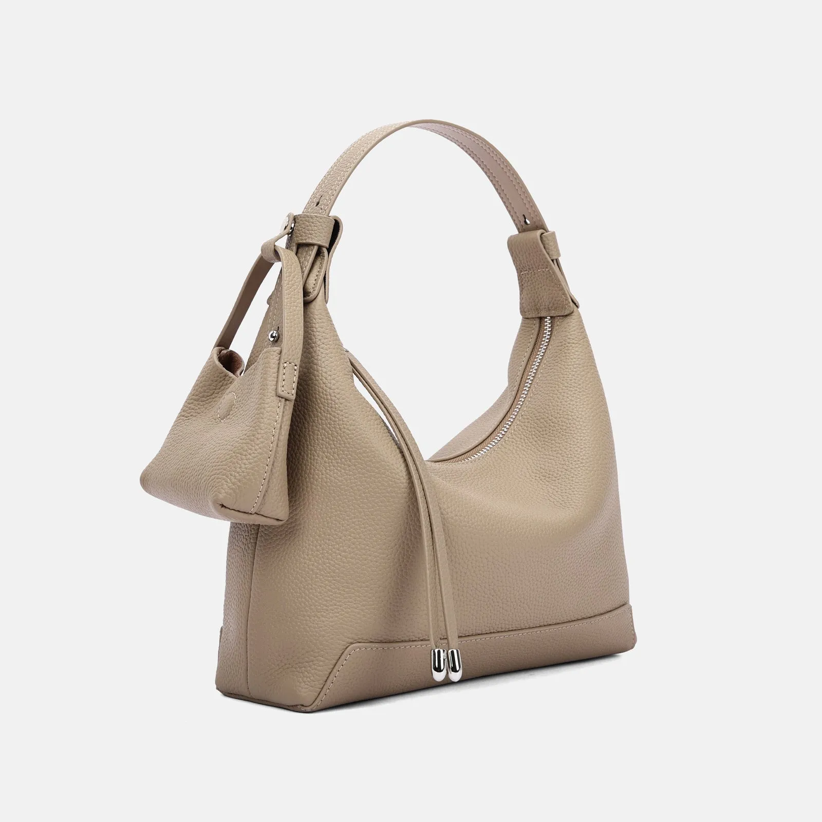 Genuine cowhide leather women's shoulder bag in urban simplicity style, shown in soft construction.