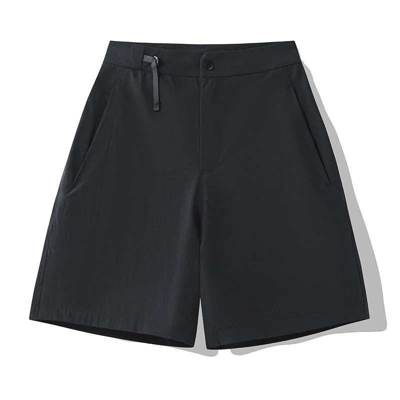 Men's solid colour sports shorts with 3D cut and stretch fabric for running.