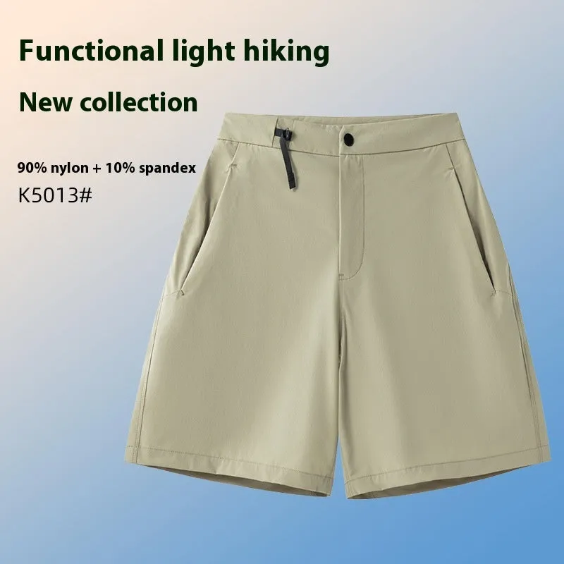 Men's solid colour sports shorts with 3D cut and stretch fabric for running.