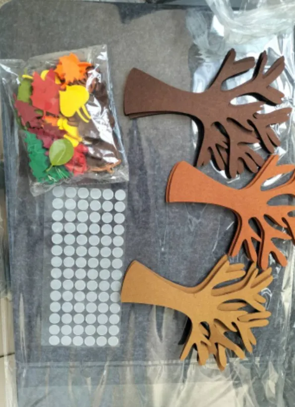 96 PCs felt tree handmade wall hanging set for children with non-woven fabric trees in green on white wall