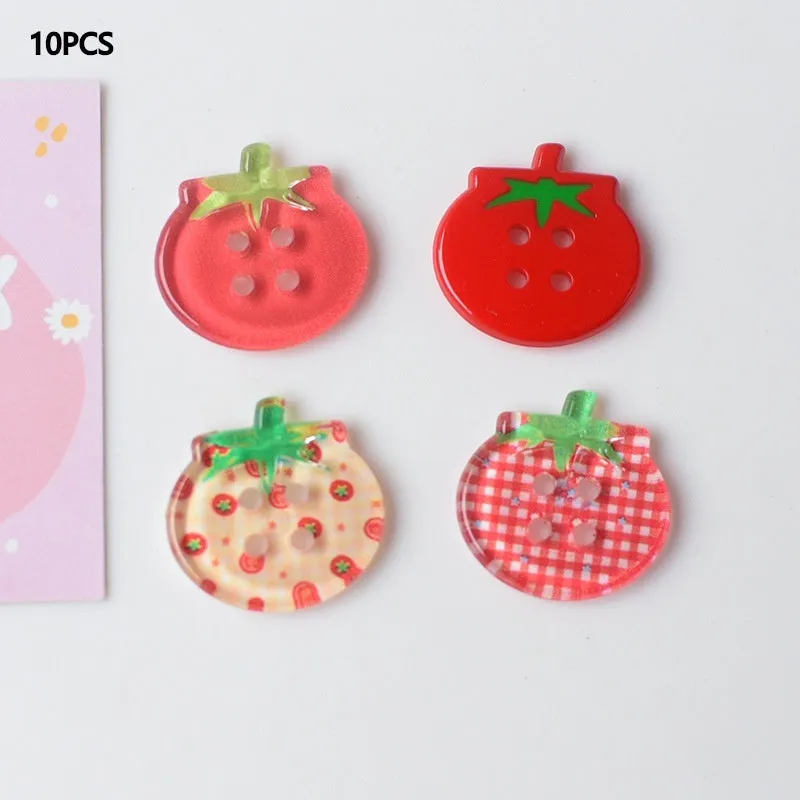 A pack of medium-sized plastic tomato button ornaments in mixed colours including red plaid and cherry tomato print.