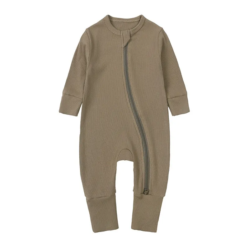 Newborn baby romper in solid colour rib fabric with zip-up closure and long sleeves, bamboo-fibre blend