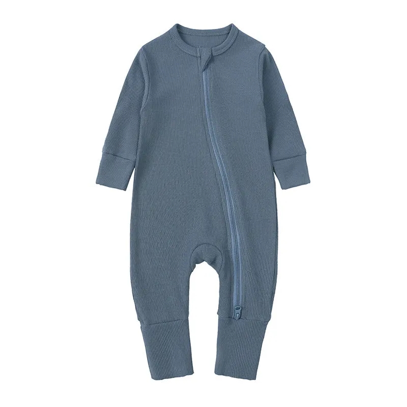 Newborn baby romper in solid colour rib fabric with zip-up closure and long sleeves, bamboo-fibre blend
