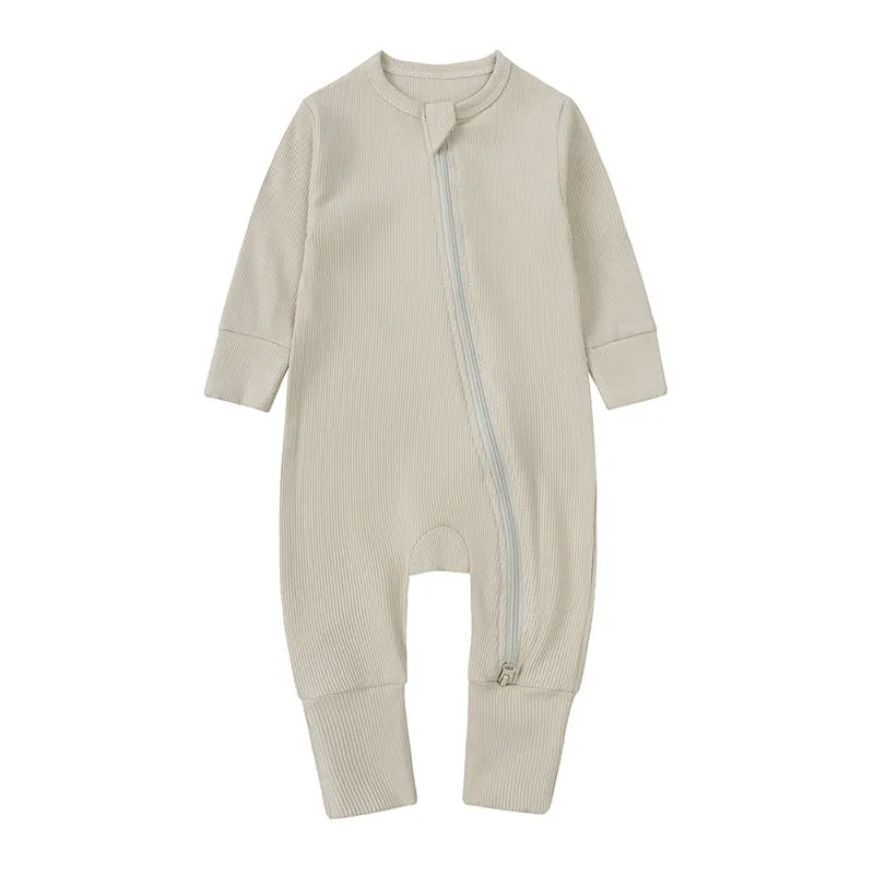 Newborn baby romper in solid colour rib fabric with zip-up closure and long sleeves, bamboo-fibre blend