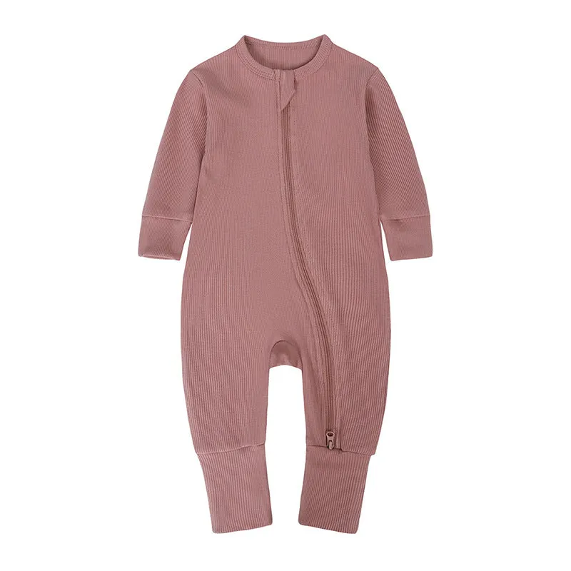Newborn baby romper in solid colour rib fabric with zip-up closure and long sleeves, bamboo-fibre blend