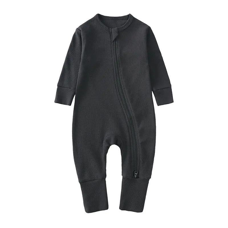 Newborn baby romper in solid colour rib fabric with zip-up closure and long sleeves, bamboo-fibre blend