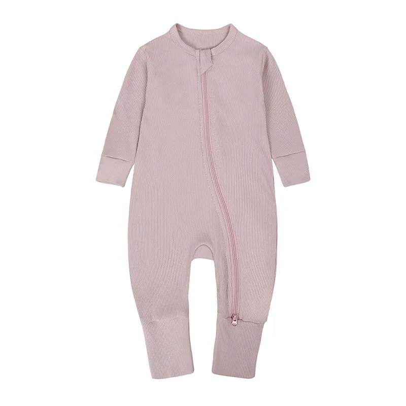 Newborn baby romper in solid colour rib fabric with zip-up closure and long sleeves, bamboo-fibre blend