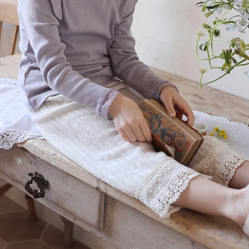 Girls loose knitted lace trim straight-leg trousers in pink, apricot, and white colours
