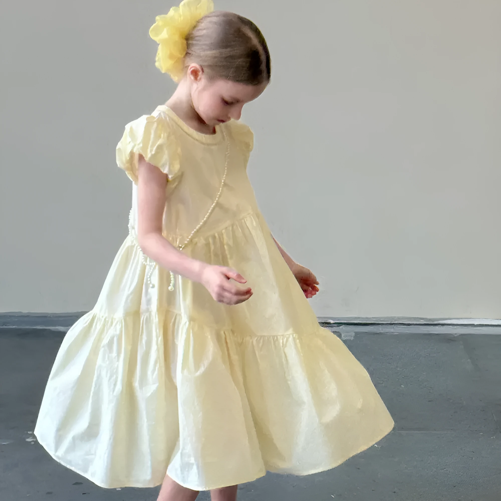 Light yellow cotton princess dress with short puff sleeves and pearl chain for girls, summer style