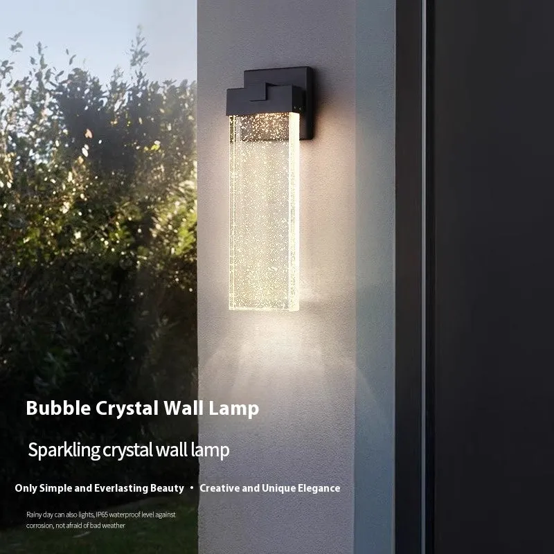 Black outdoor LED wall light with stainless steel shell, shown in large and small size options.