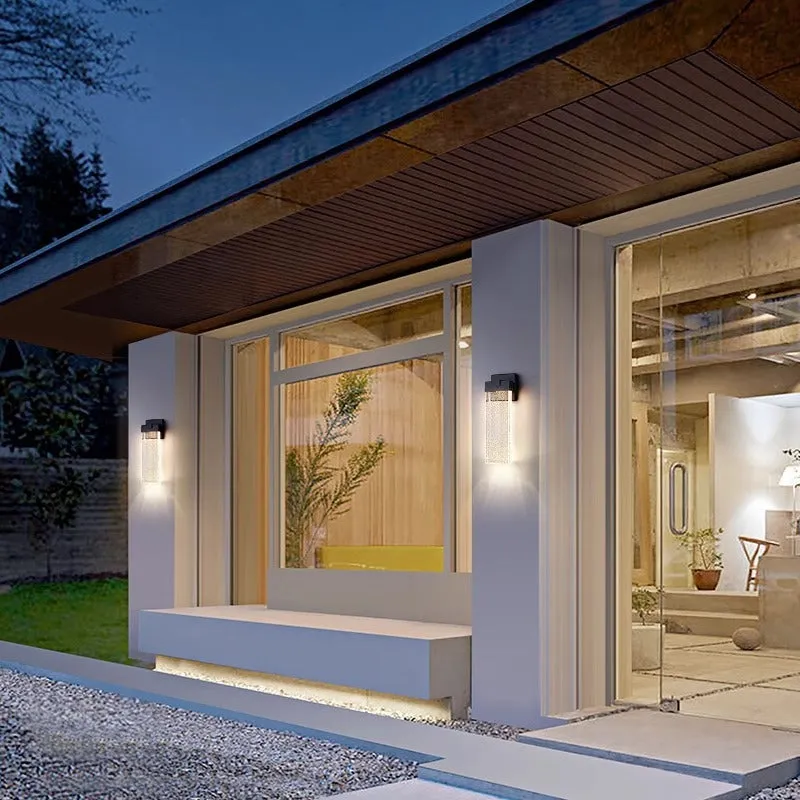 Black outdoor LED wall light with stainless steel shell, shown in large and small size options.