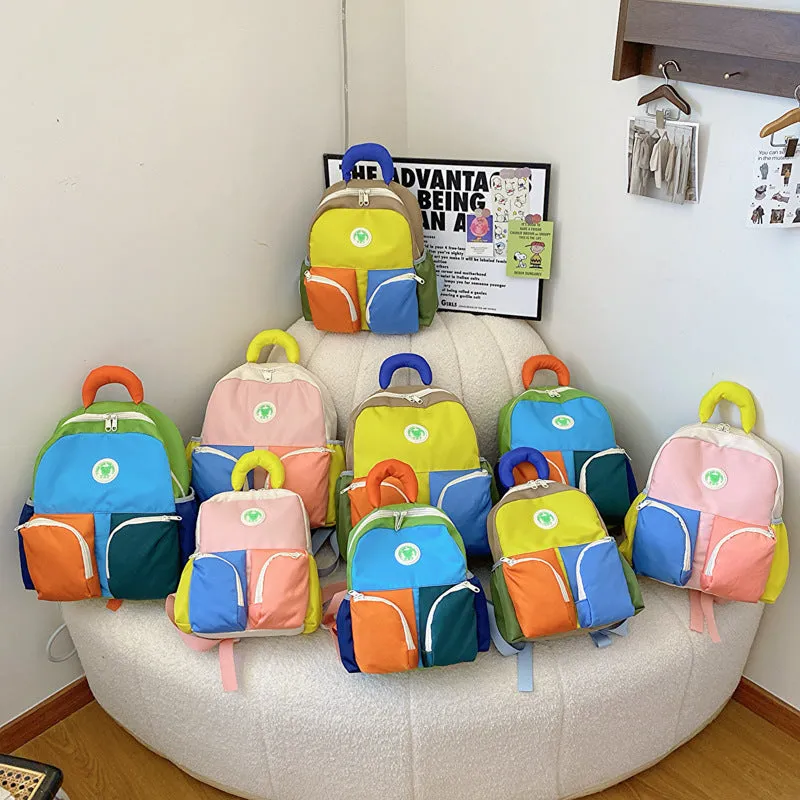 Children's trendy backpack in solid colour, lightweight Oxford cloth, blue pink yellow sizes small medium large