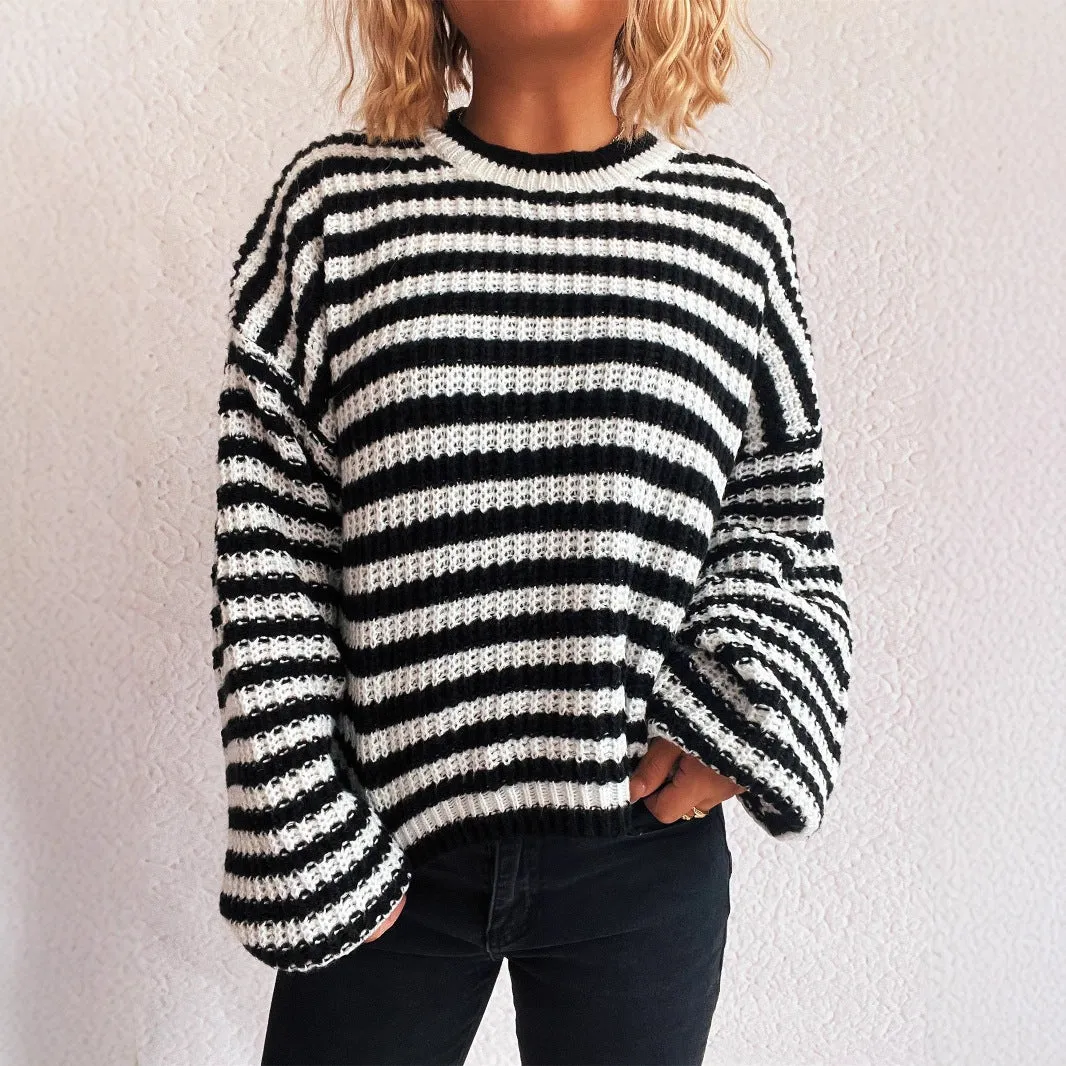 Vintage stripe women's loose fit pullover sweater in red, shown with long sleeves and a round neck.