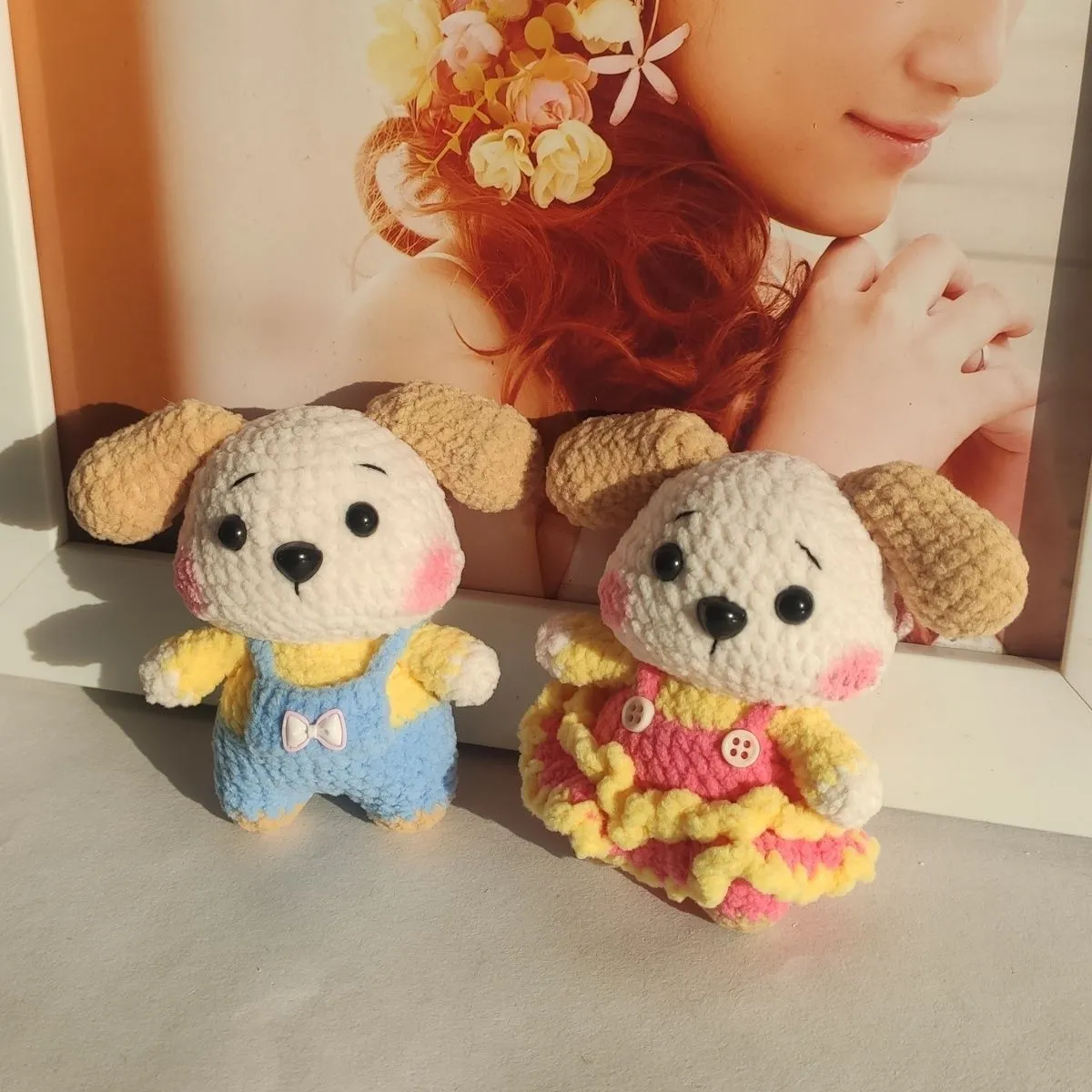 Handmade woollen zodiac dog pendant charm on a keychain, shown in pinafore dress style.