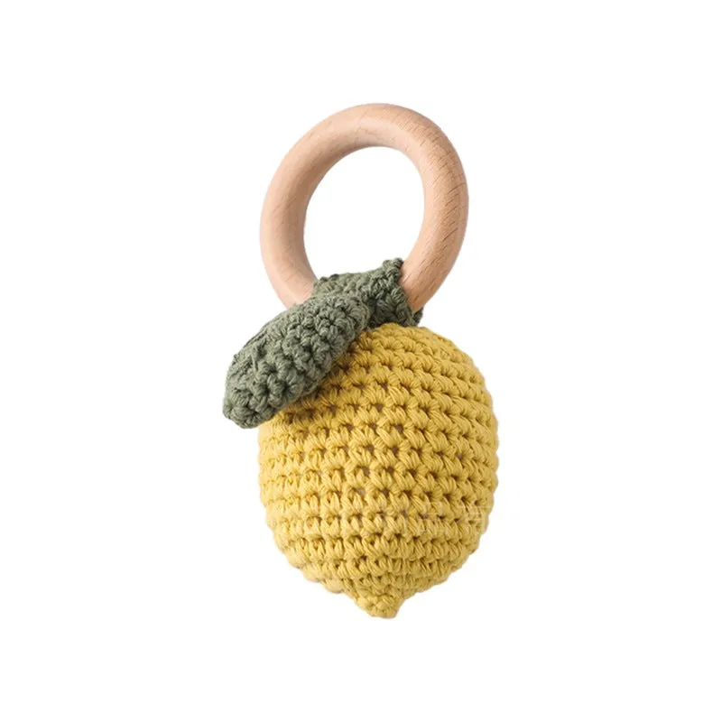 Wooden fruit rattle toy in banana colour for newborn grasping and sensory play