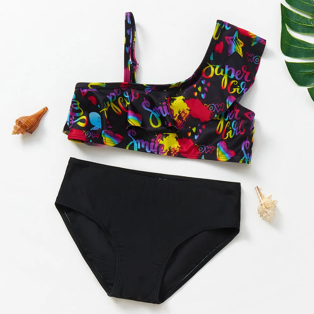 Girls' oblique shoulder strap split swimsuit in black graffiti, polyester fiber, fresh pattern briefs style