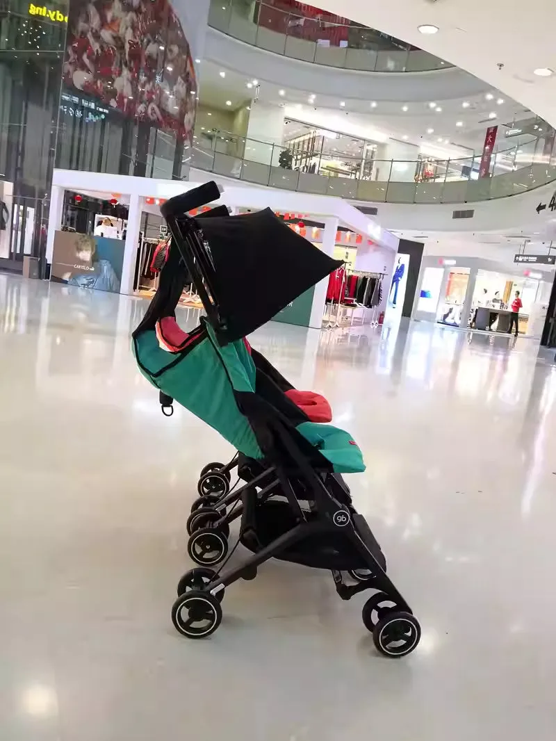 Ultra-light portable foldable reclining stroller with aluminium frame in Black, side view