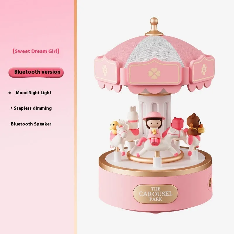 Carousel music box with ambience light showing rotating figurine and USB charging base