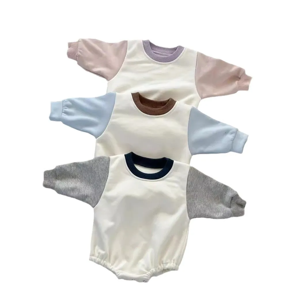 Baby romper in cotton triangle jumpsuit style with hidden hook closure, autumn weight, available in multiple colours
