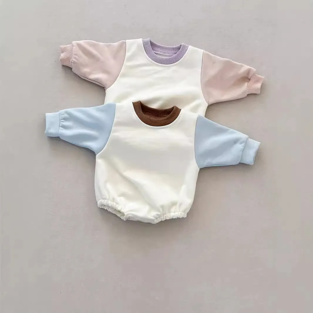 Baby romper in cotton triangle jumpsuit style with hidden hook closure, autumn weight, available in multiple colours