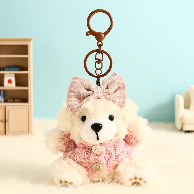 Plush biscuit bear keychain pendant with coloured bow on a soft teddy bear design