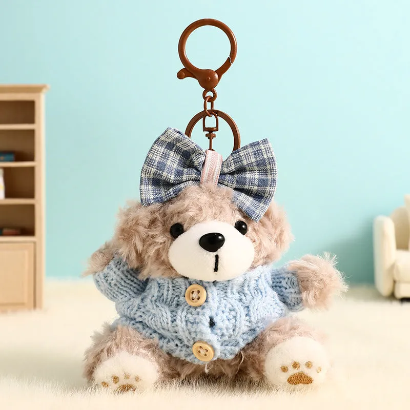 Plush biscuit bear keychain pendant with coloured bow on a soft teddy bear design