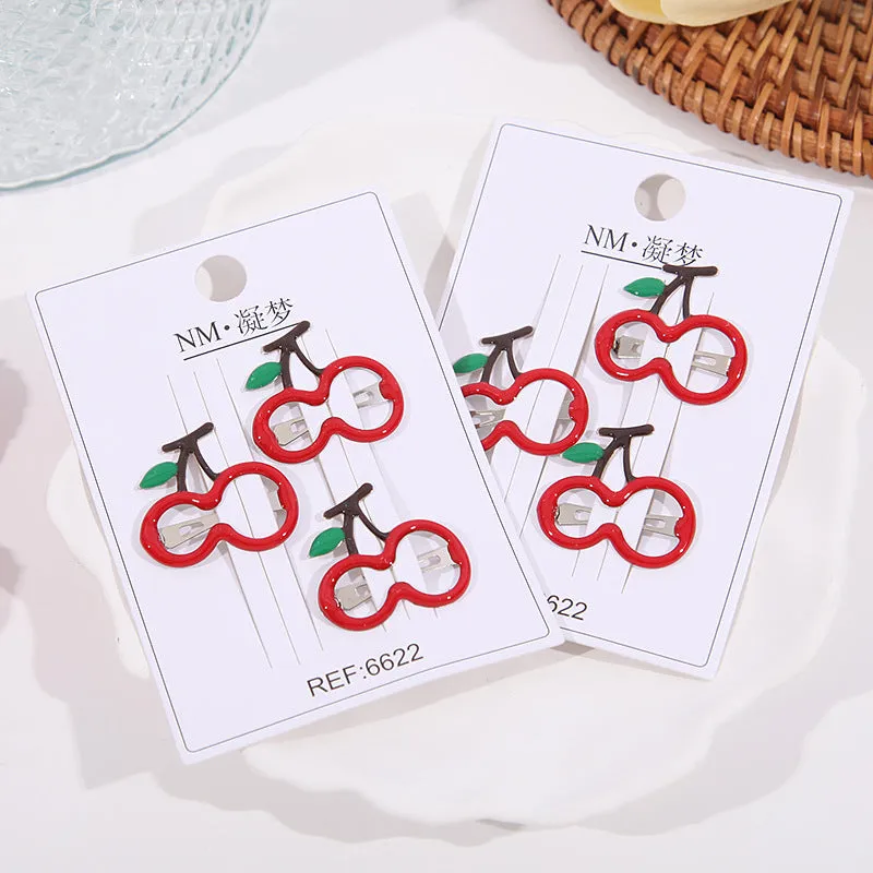 Children's plastic cartoon fruit hairpins in apple, cherry, and strawberry styles, gentle on hair