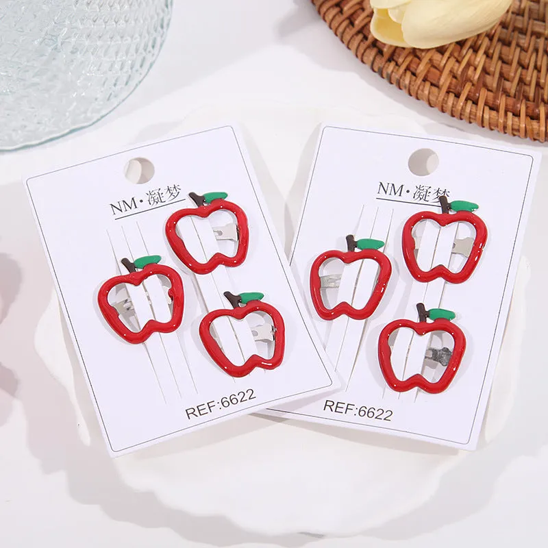 Children's plastic cartoon fruit hairpins in apple, cherry, and strawberry styles, gentle on hair
