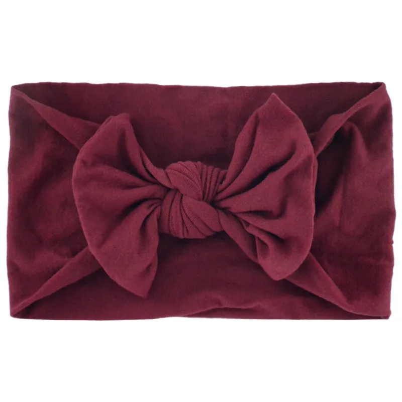 Super stretchy soft knot headband with hair bow for baby girls in one of 22 colours