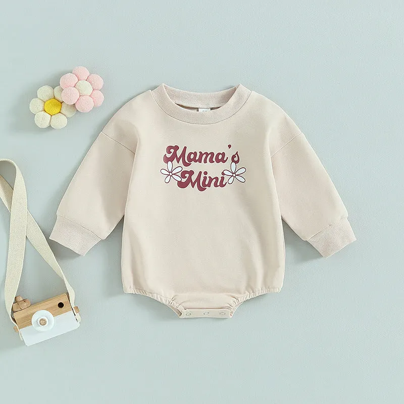 Girls' long-sleeved cotton top with letter flower print in apricot, hide hook closure, front view