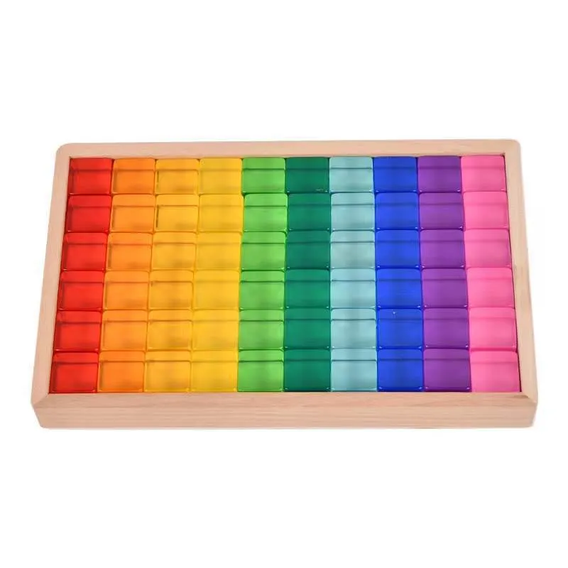 Wooden building block set with clear acrylic high permeability tiles on a tray, 29cm square