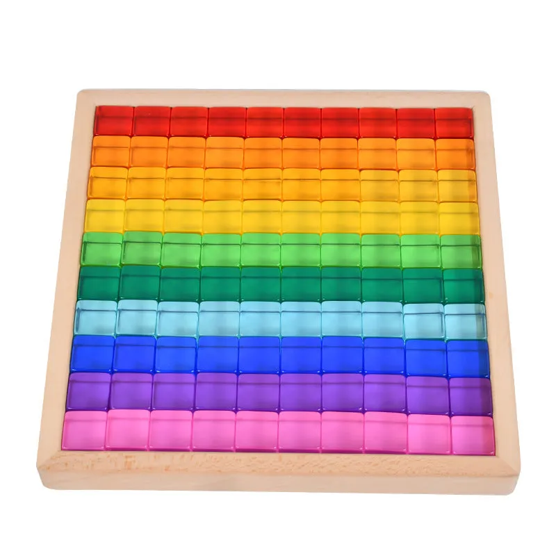 Wooden building block set with clear acrylic high permeability tiles on a tray, 29cm square