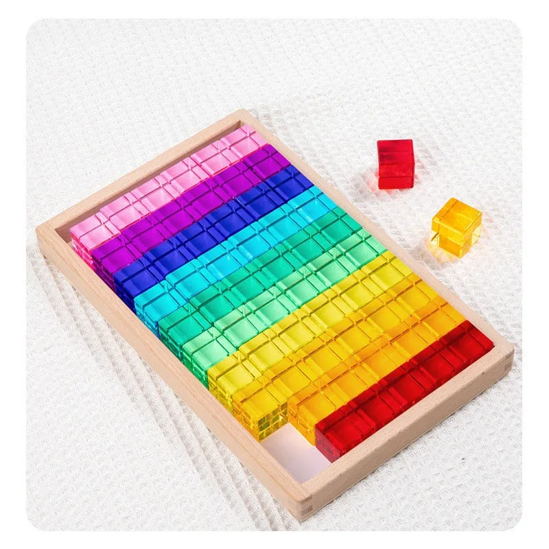 Wooden building block set with clear acrylic high permeability tiles on a tray, 29cm square