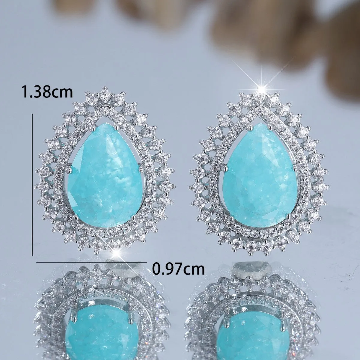 White diamond water drop ice flower earrings with heart-shaped copper design and electroplated platinum finish