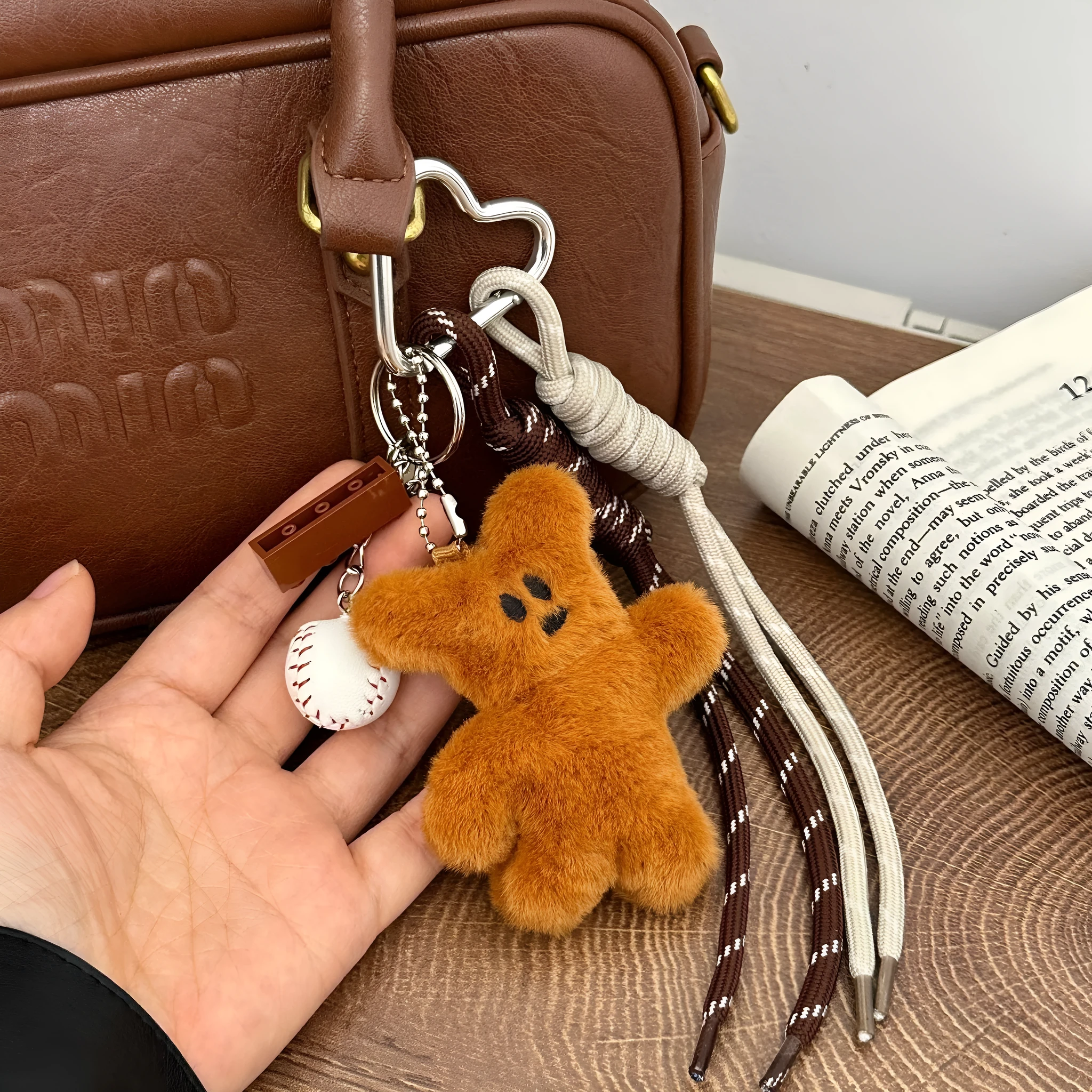 Plush brown bear doll pendant on a bag charm with soft fabric and small size