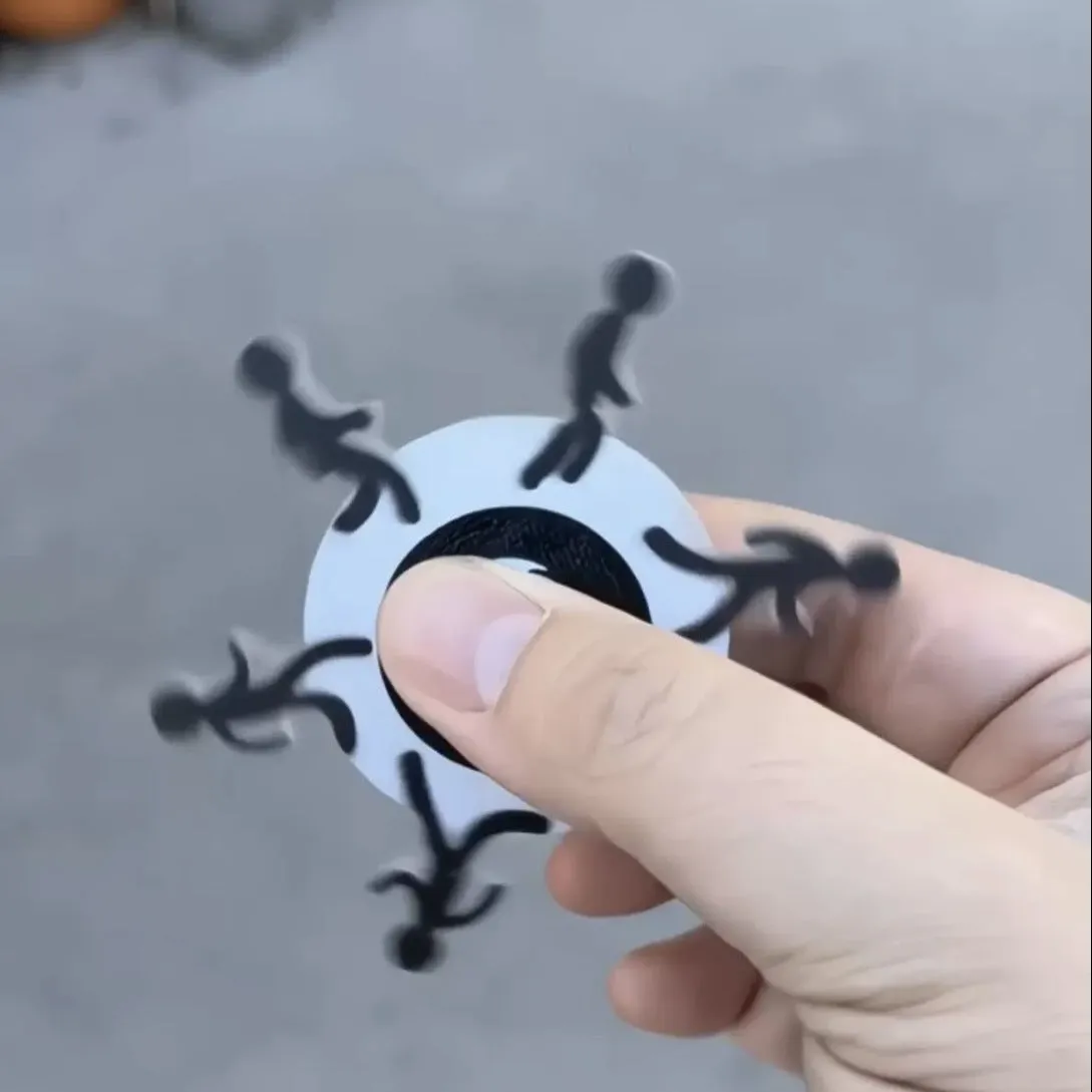 Colourful stickman running dynamic fingertip gyro on a white surface, spinning motion visible