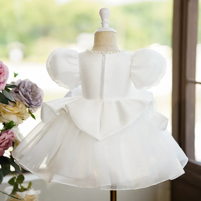 White polyester princess-style girls' piano performance dress for recitals, available in sizes 80cm to 130cm