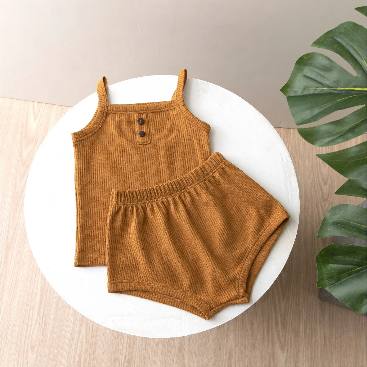 Summer baby camisole set with short sleeves and matching shorts in light yellow cotton fabric
