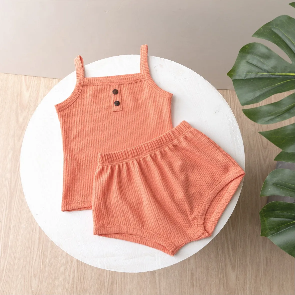 Summer baby camisole set with short sleeves and matching shorts in light yellow cotton fabric