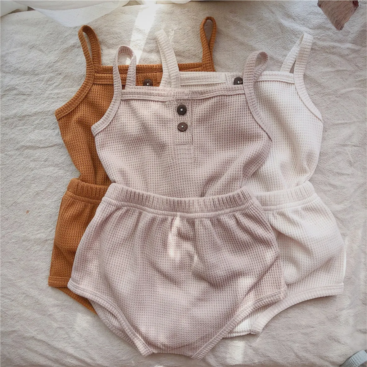 Summer baby camisole set with short sleeves and matching shorts in light yellow cotton fabric