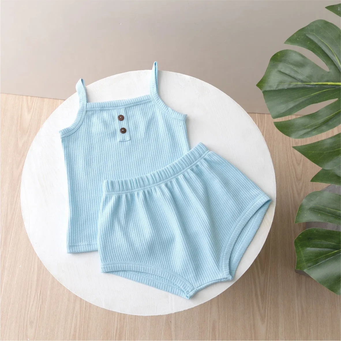 Summer baby camisole set with short sleeves and matching shorts in light yellow cotton fabric