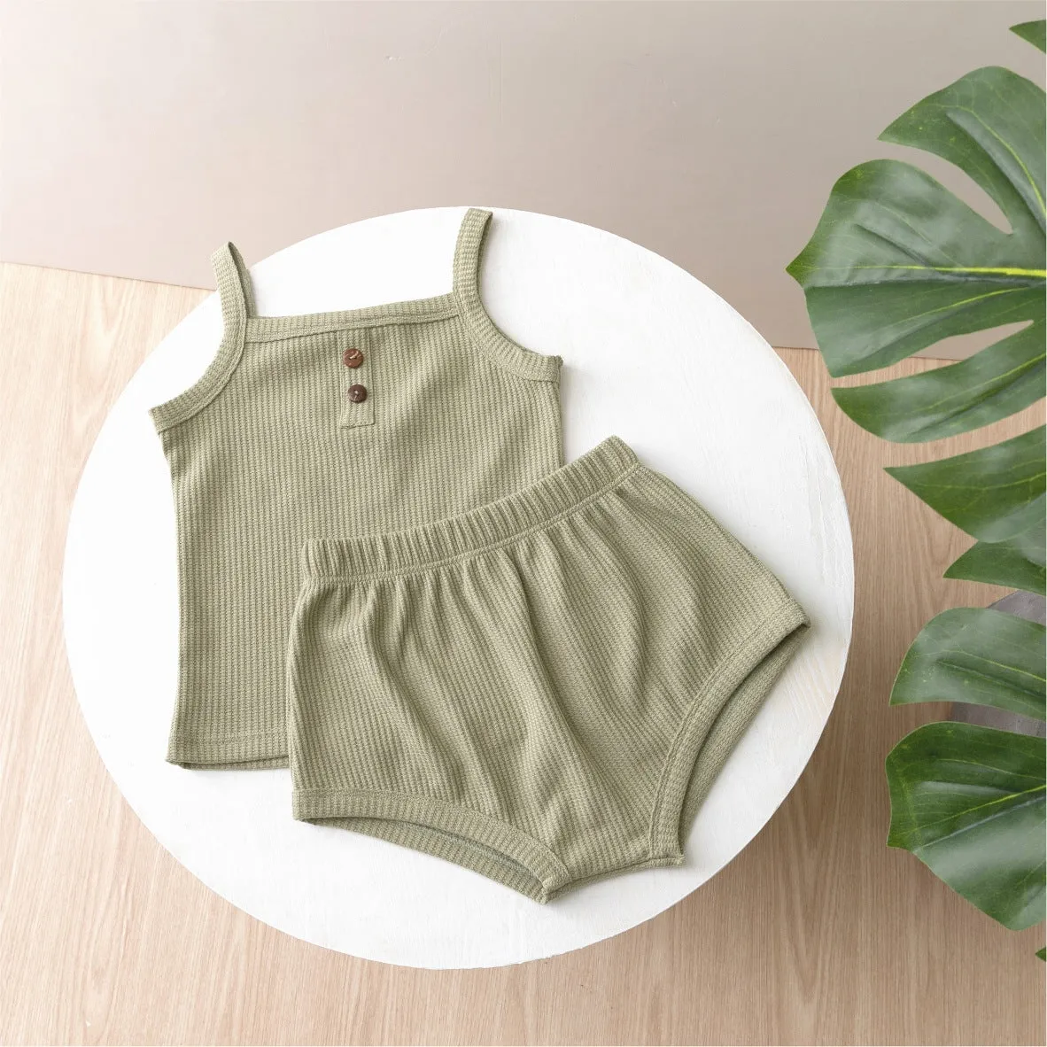 Summer baby camisole set with short sleeves and matching shorts in light yellow cotton fabric