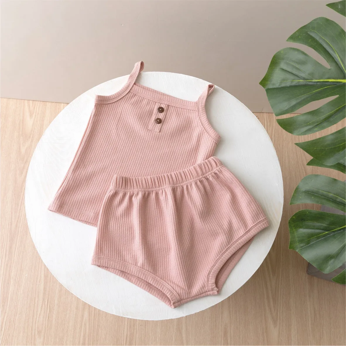 Summer baby camisole set with short sleeves and matching shorts in light yellow cotton fabric
