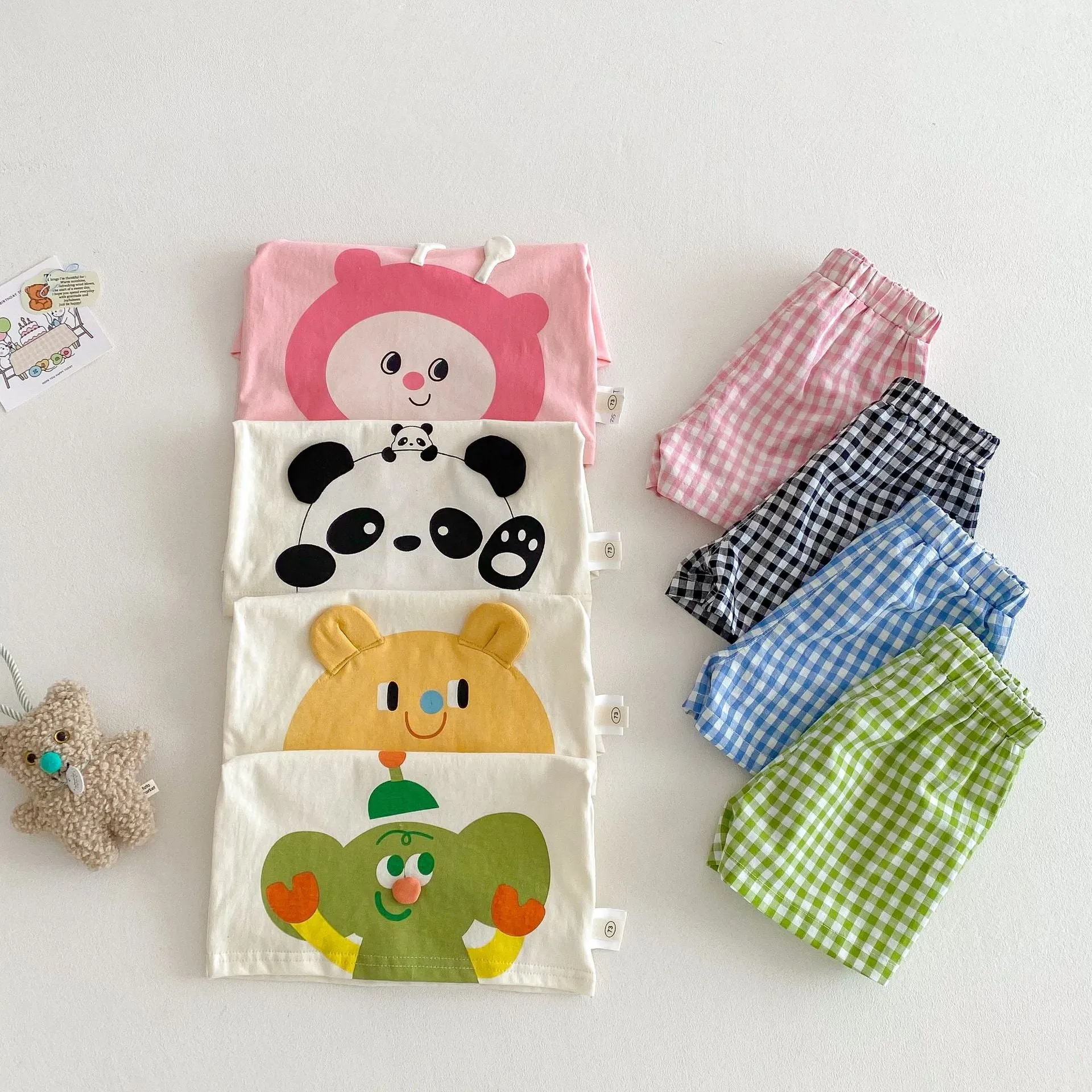 Girls' cotton cartoon T-shirt and plaid shorts two-piece set in avocado green and peach