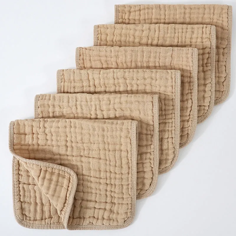 Set of six large muslin burp cloths 25x50cm in assorted colours on white background