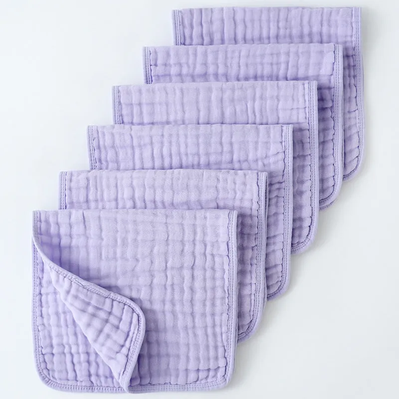 Set of six large muslin burp cloths 25x50cm in assorted colours on white background